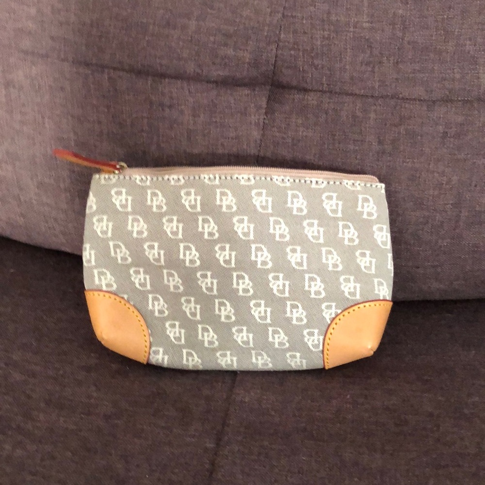 Mini makeup bag by Dooney & Bourke